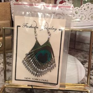 Beautiful peacock earrings!  Never wore